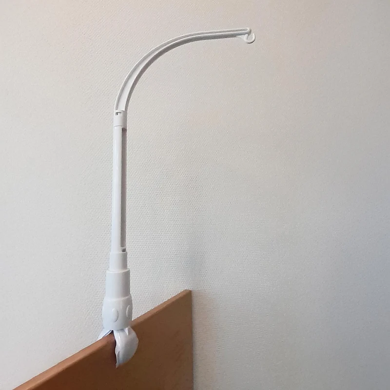 Mobilehalter für Rundstab, mit Spieluhr