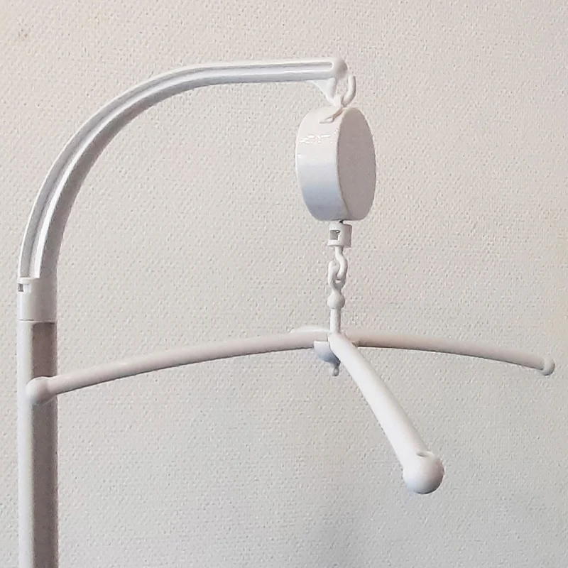 Mobilehalter für Rundstab, mit Spieluhr