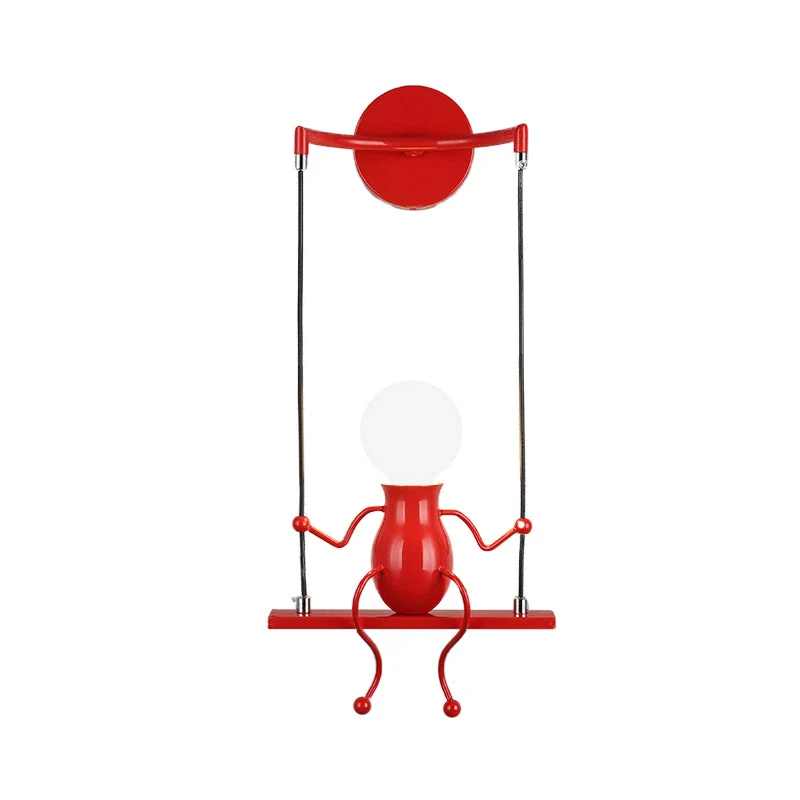 SwingMuse | Wandleuchte mit schaukelnder Figur