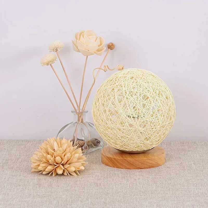 WovenGlow Hand Woven Rattan Ball Table Lamp With Warm Light Euroselle