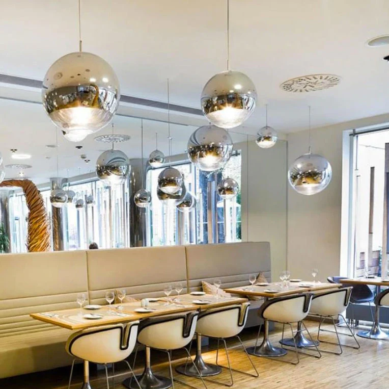 AuroraSphere Two Tone Glass Orb Pendant Light With Silver And Clear Hemispheres Euroselle