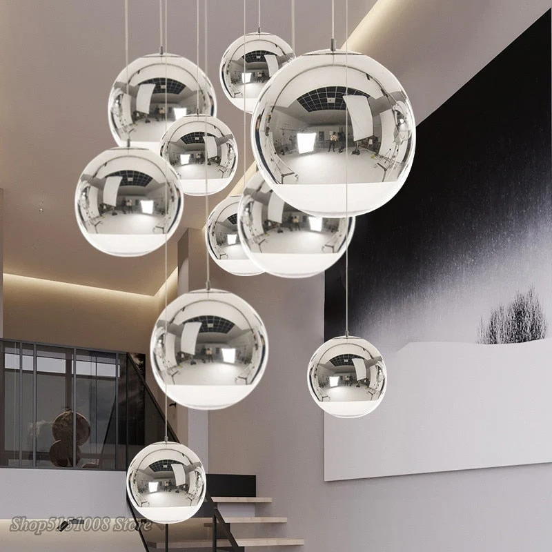 AuroraSphere Two Tone Glass Orb Pendant Light With Silver And Clear Hemispheres Euroselle