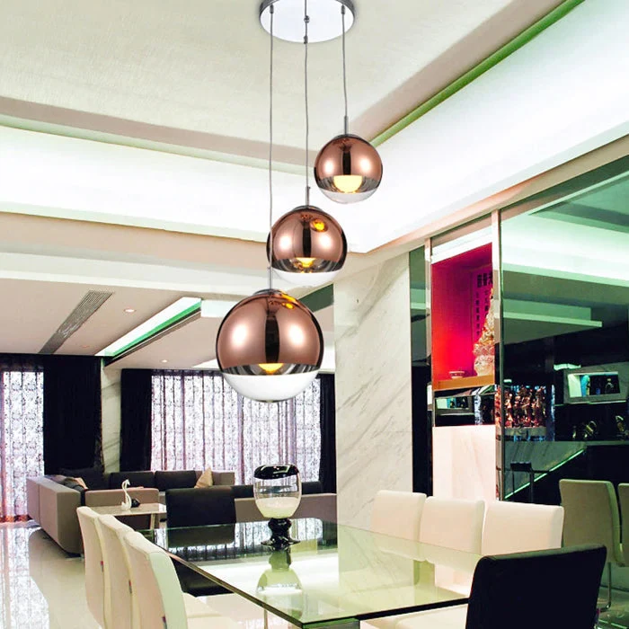 AuroraSphere Two Tone Glass Orb Pendant Light With Silver And Clear Hemispheres Euroselle