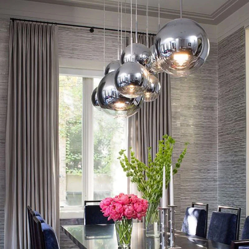 AuroraSphere Two Tone Glass Orb Pendant Light With Silver And Clear Hemispheres Euroselle