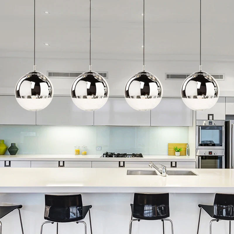 AuroraSphere Two Tone Glass Orb Pendant Light With Silver And Clear Hemispheres Euroselle