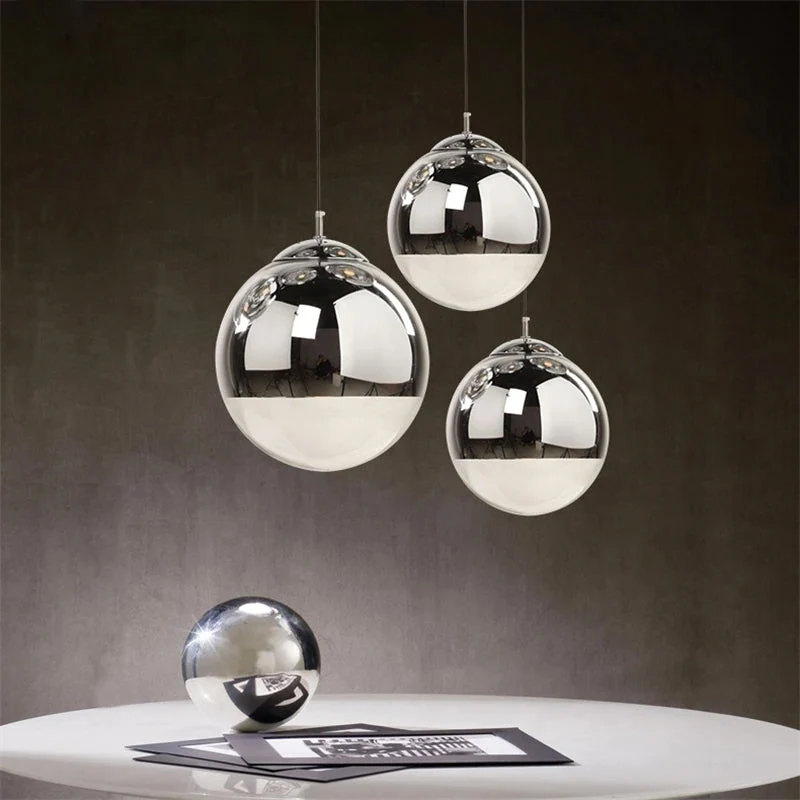 AuroraSphere Two Tone Glass Orb Pendant Light With Silver And Clear Hemispheres Euroselle