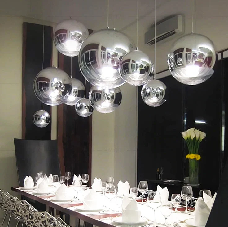 AuroraSphere Two Tone Glass Orb Pendant Light With Silver And Clear Hemispheres Euroselle